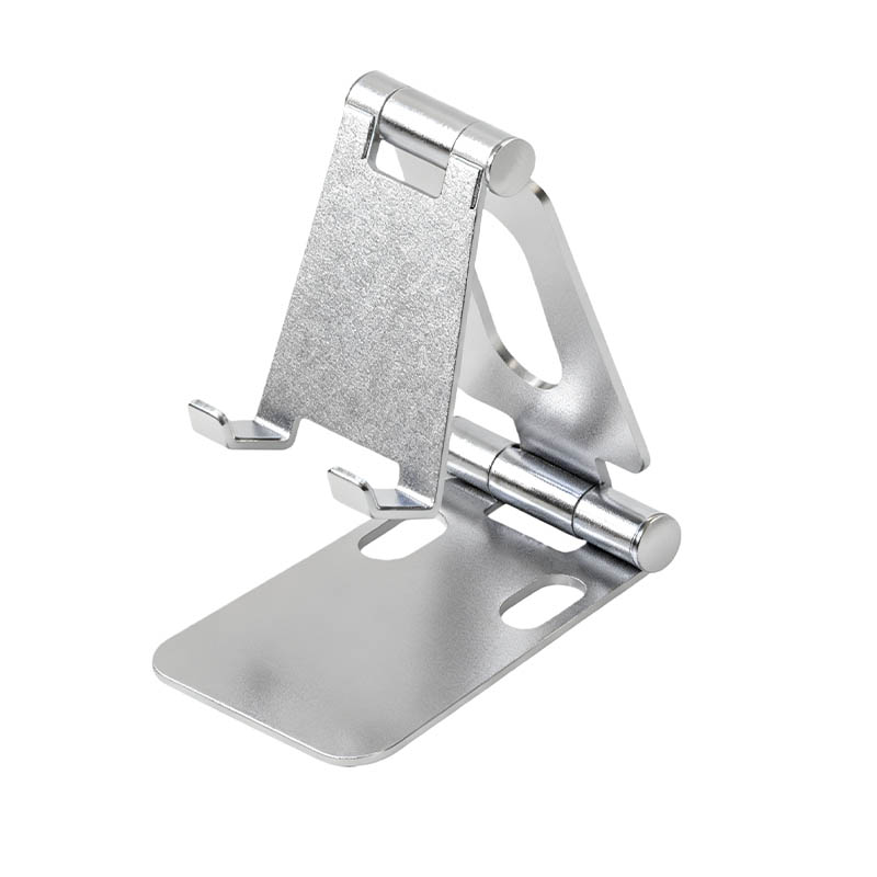 How can the compatibility of mobile phone holders with various digital device interfaces be enhanced through design?